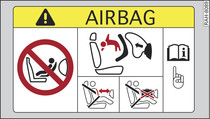 Солнцезащитный козырек на стороне пассажира: наклейка с информацией о подушке безопасности