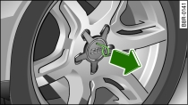 Substituição de uma roda: retirar os tampões dos cubos